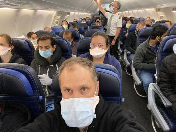 A United Airlines flight from Newark to San Francisco is crowded with passengers in this picture obtained from social media 