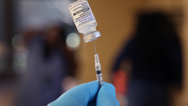 COVID-19 Omicron Booster Shots Administered Along With Other Vaccines At Chicago Senior Center 
