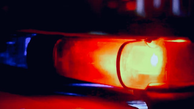 Police car with emergency lights - law enforcement concept 