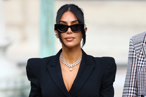 Kim Kardashian leaves the courthouse after testifying in the trial of 10 people accused of stealing millions of dollars' worth of jewelry from her while holding her at gunpoint during Paris Fashion Week in 2016, in Paris, France, May 13, 2025. 